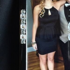 Sexy black little cocktail dress, ruffle waist.